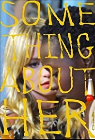SOMETHING ABOUT HER